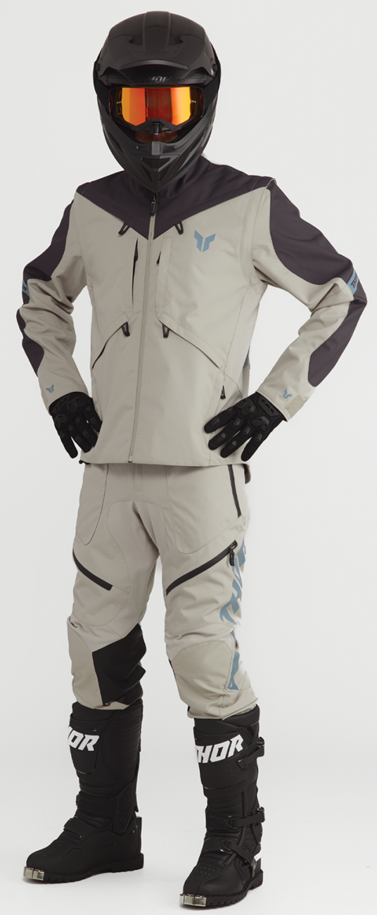 THOR Terrain In-the-Boot motorcycle pants in sand color, US size 44, with reinforced knee panels and durable fabric.