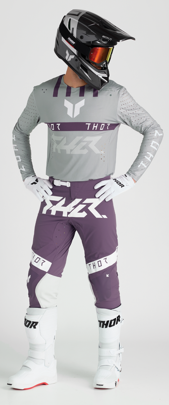 White THOR Launchmode gloves in size XL with adjustable wrist closure and reinforced palm grip for motocross riding.