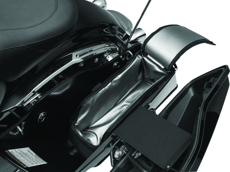 Kuryakyn Saddlebag Cooler Black for powersports, keeps beverages cold, shown attached to motorcycle saddlebag.