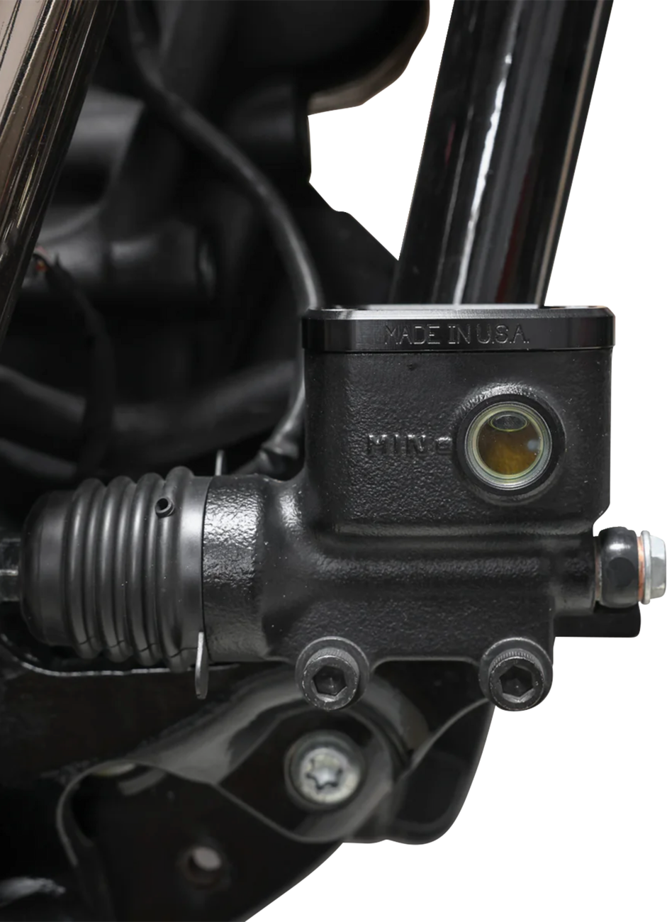 Black rear brake reservoir cap for '18+ Softail by THRASHIN SUPPLY CO., designed for easy installation and durability.