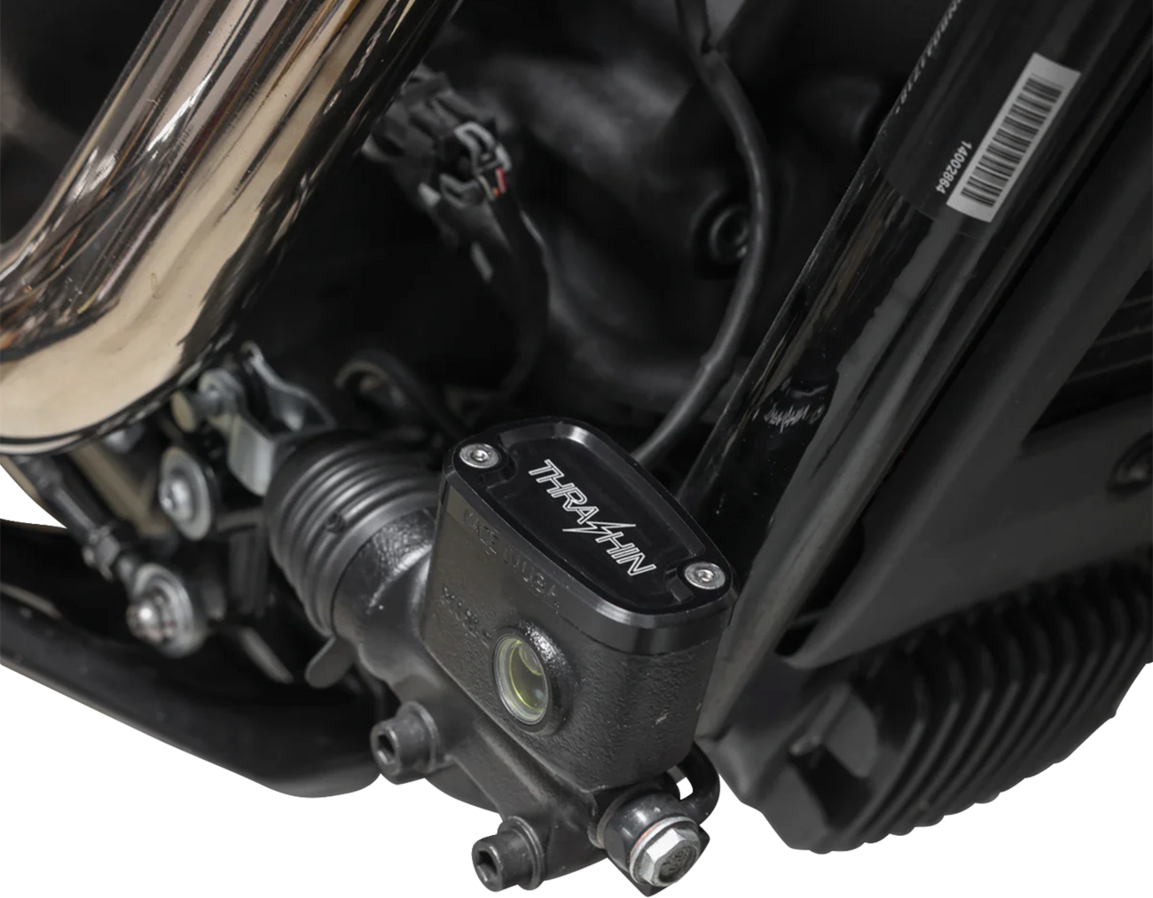 Black rear brake reservoir cap by THRASHIN SUPPLY CO. for '18+ Softail motorcycles, featuring Twice Cut design.