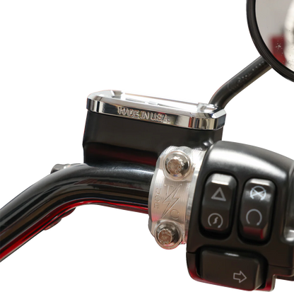 Chrome front brake master cylinder cover by THRASHIN SUPPLY CO., with engraved branding, designed for motorcycle braking systems.