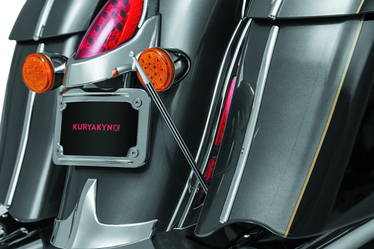 Kuryakyn antenna adapter for Indian and Victory motorcycles, part 869, shown attached to motorcycle antenna connection.