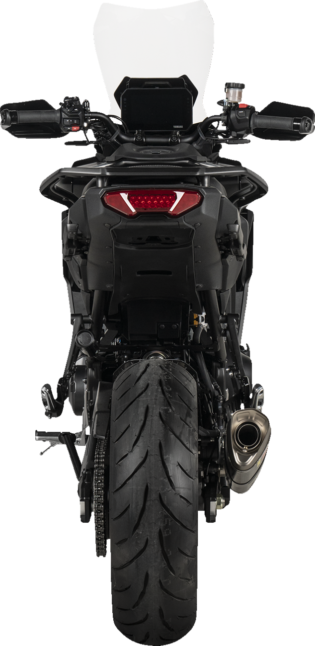 AKRAPOVIC Racing Line exhaust system with carbon fiber finish for Yamaha Tracer 9 motorcycle, showcasing sleek design and high-performance quality.