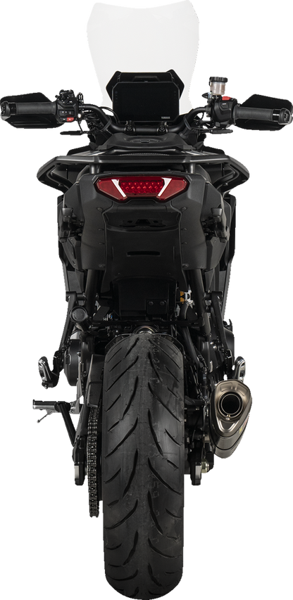 AKRAPOVIC Racing Line exhaust system with carbon fiber finish for Yamaha Tracer 9 motorcycle, showcasing sleek design and high-performance quality.