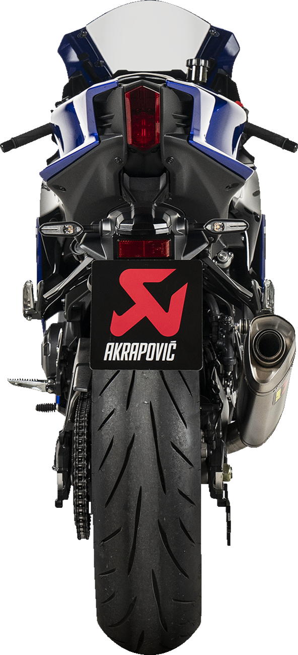 AKRAPOVIC Racing Line titanium exhaust system for Yamaha R9 motorcycle, featuring sleek metal finish and performance design.