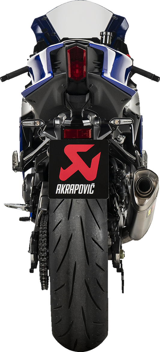 AKRAPOVIC Racing Line titanium exhaust system for Yamaha R9 motorcycle, featuring sleek metal finish and performance design.