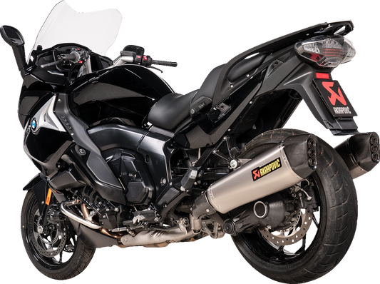 AKRAPOVIC slip-on titanium mufflers for BMW K1600 GT and GTL motorcycles, featuring sleek stainless steel design and branding.