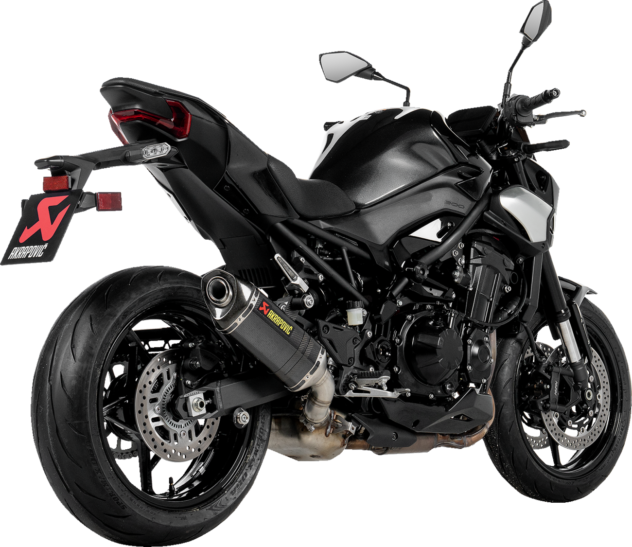 Akradovic slip-on line muffler for Kawasaki Z900, made of carbon fiber, designed by AKRAPOVIC, shown on a motorcycle.
