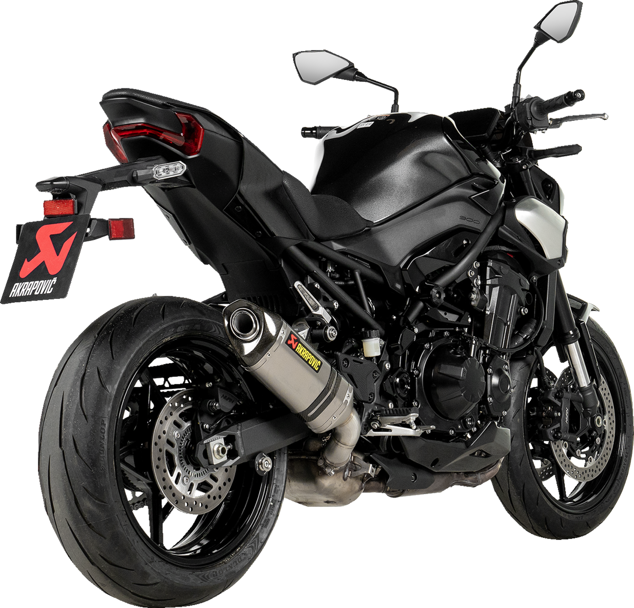 AKRAPOVIC titanium slip-on muffler for Kawasaki Z900 motorcycle, showcasing sleek exhaust design and branding.