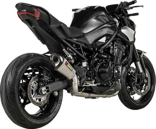 AKRAPOVIC Slip-On Line Muffler for Kawasaki Z900 titanium race exhaust, showing the sleek muffler with branding details.