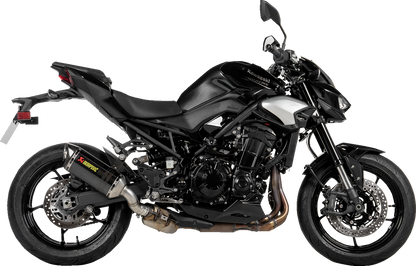 Akradovic slip-on line muffler for Kawasaki Z900 in carbon fiber, designed by AKRAPOVIC, shown on a motorcycle.
