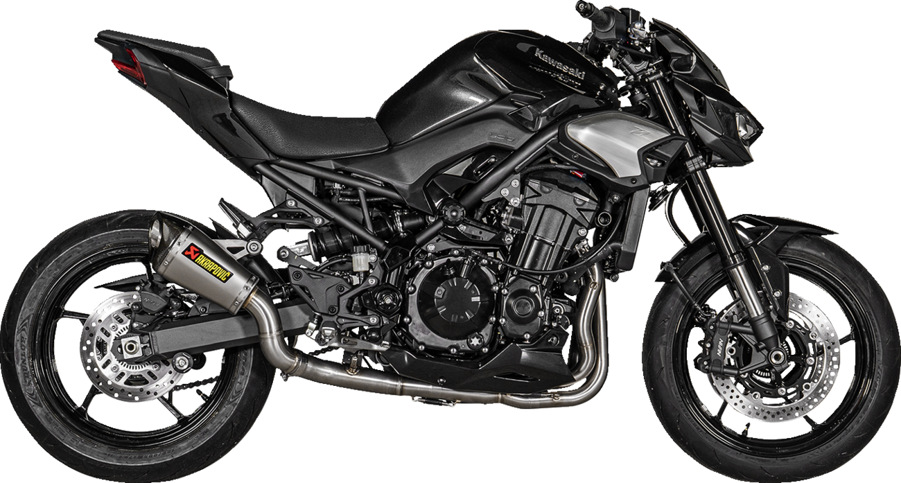 AKRAPOVIC titanium slip-on exhaust muffler for Kawasaki Z900 motorcycle, racing style with sleek titanium finish.