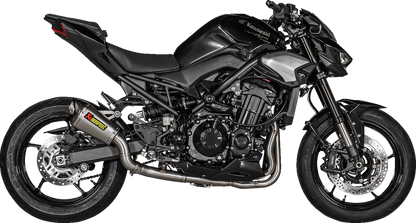 AKRAPOVIC titanium slip-on exhaust muffler for Kawasaki Z900 motorcycle, racing style with sleek titanium finish.