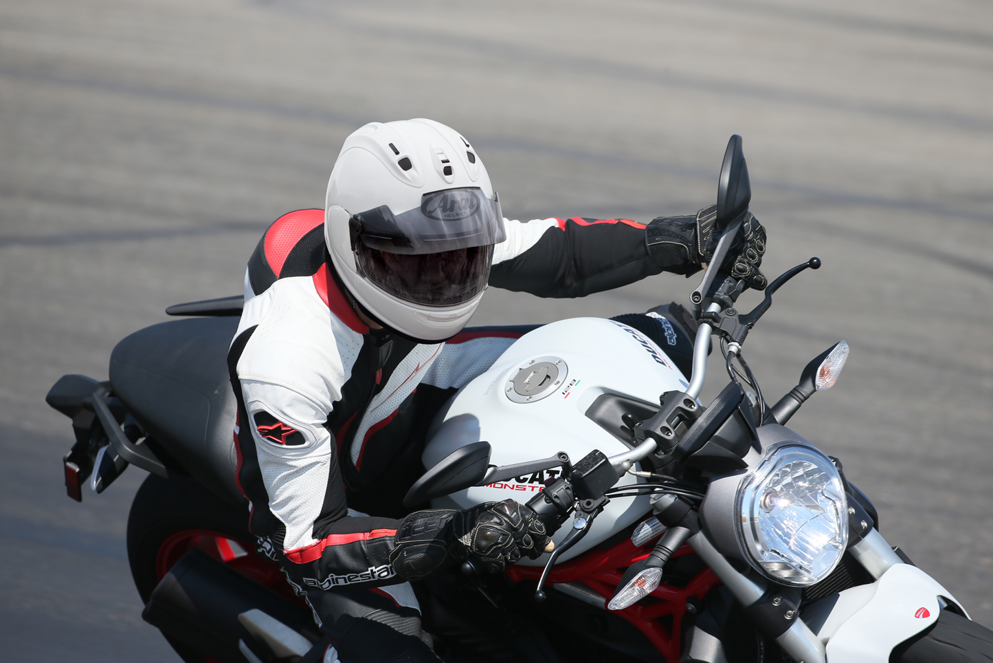 White ARAI HELMETS Corsair-X motorcycle helmet with XL size, featuring a sleek design and aerodynamic shape.