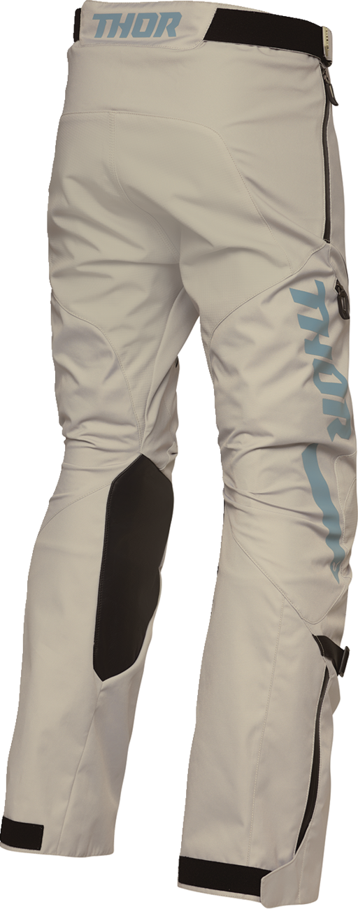 THOR Terrain over-the-boot pants in sand color, US size 30, durable motorcycle riding gear with reinforced knee panels.