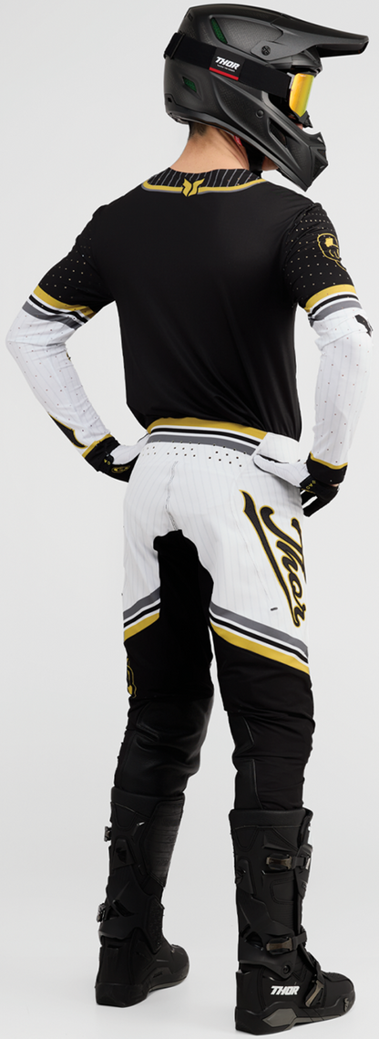 Black and gold THOR Sportmode Baller Pants in US size 32, featuring sporty design and athletic fit.