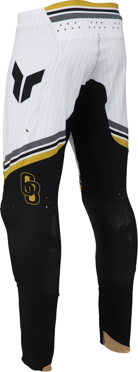 Black and gold THOR Sportmode Baller Pants in US 32, featuring sporty design and durable fabric for active wear.