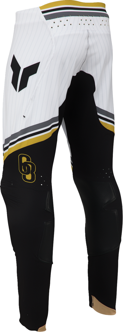 Black and gold THOR Sportmode Baller Pants in US 32, featuring sporty design and durable fabric for active wear.