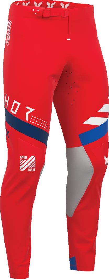 Red THOR Sportmode Synth Pants in US size 33, featuring sleek design and performance fabric, suitable for motocross riding.