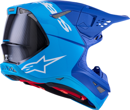 Alpinestars Supertech M10 helmet in flood blue and black with carbon finish and MIPS® technology, shown from the side.