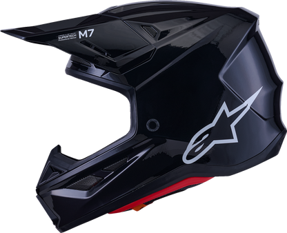 Alpinestars SM7 helmet in solid gloss black, large size, featuring a sleek aerodynamic design and ventilation ports.