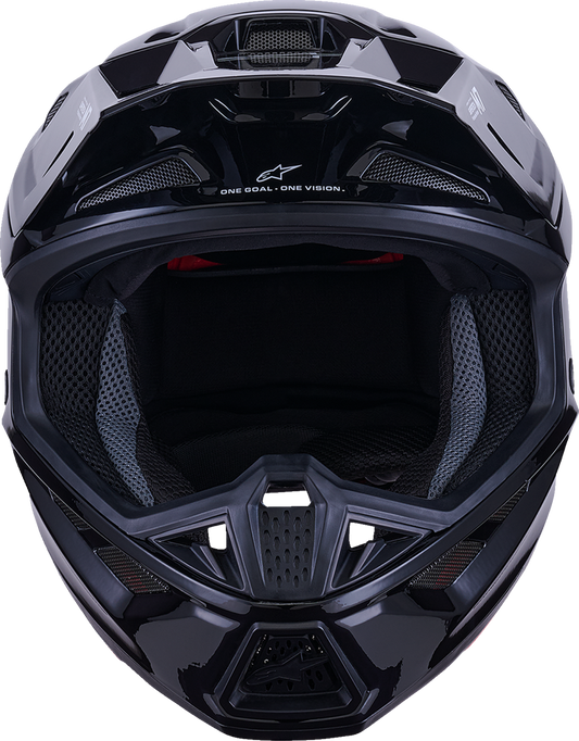 Alpinestars SM7 helmet in solid gloss black, XL size, with aerodynamic design and secure chin strap for motorcycle riding.