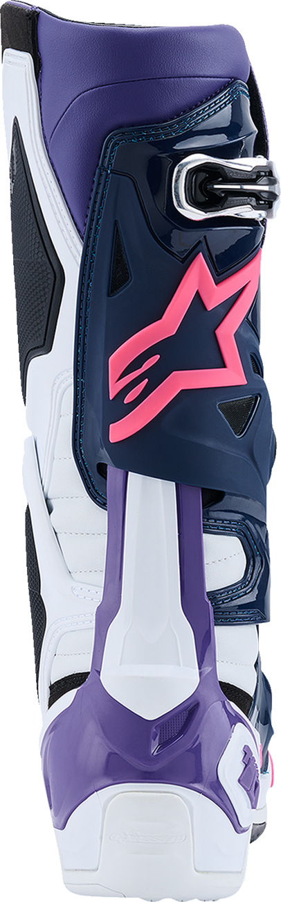 Alpinestars Tech 10 motocross boots in white, violet, navy, and pink fluorescent with protective features and adjustable straps.
