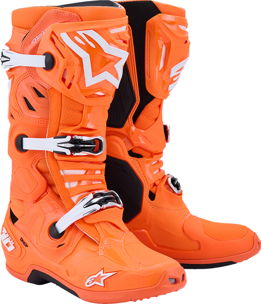 Alpinestars Tech 10 Supervented motocross boots in fluorescent orange, black, and white, US size 9, with protective design.