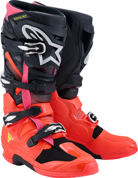 Alpinestars Tech 7 off-road motorcycle boots in black, fluorescent red, and pink, US 12 / EU 47, showing rugged design and protective features.