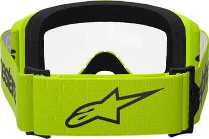 Alpinestars GOGGLES Vision 3 with yellow frame and clear lens, featuring a wordmark design for motocross or racing use.