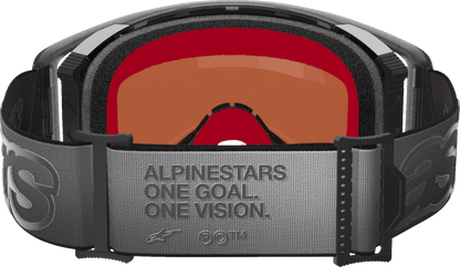 Alpinestars Supertech Vision Goggle with black frame and gold mirror lens, designed for motorcycle racing and high-performance riding.