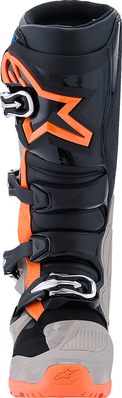 Alpinestars Tech 7 Enduro motorcycle boots in black, warm gray, and fluorescent orange, US size 8, with rugged design and protective features.
