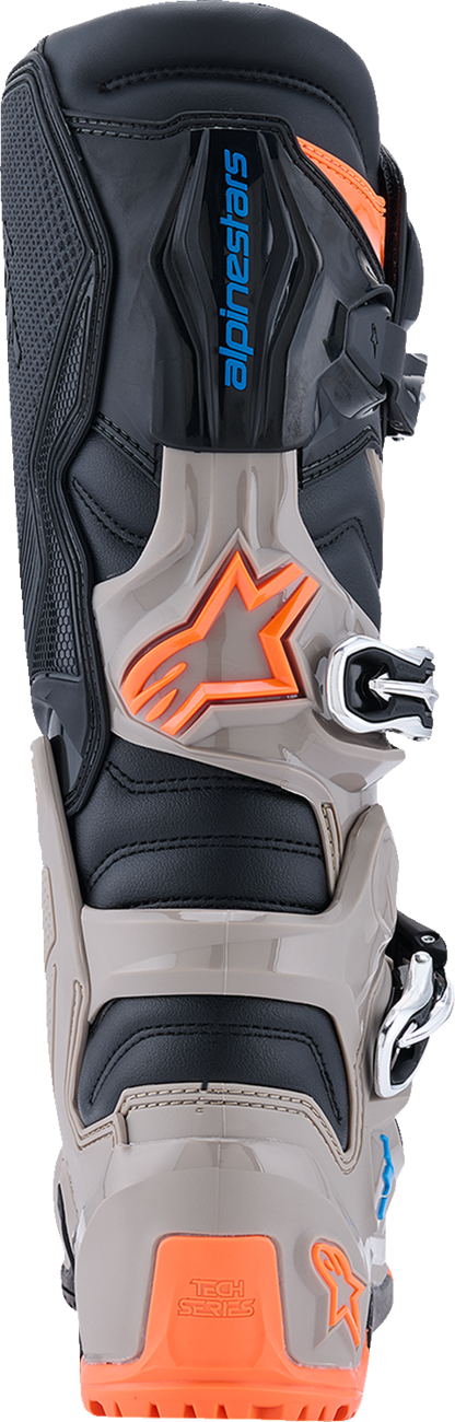 Alpinestars Tech 7 Enduro motorcycle boots in black, warm gray, and fluorescent orange, US size 8, showing rugged design and protective features.