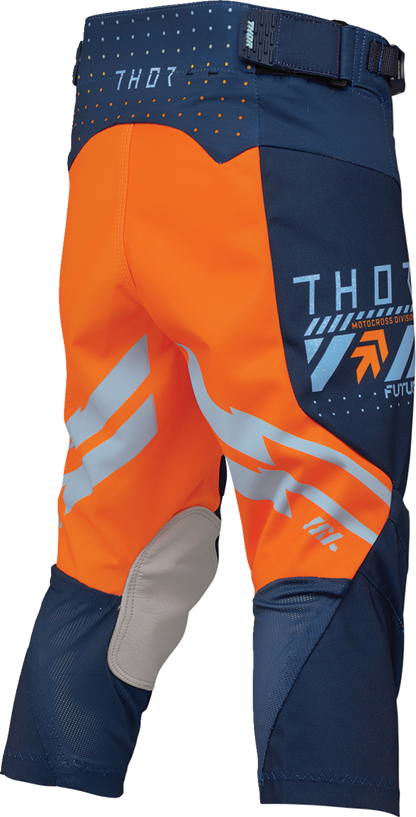 Youth THOR Launchmode Futura Pants in navy and orange with sporty design and adjustable waistband, ideal for active riding.