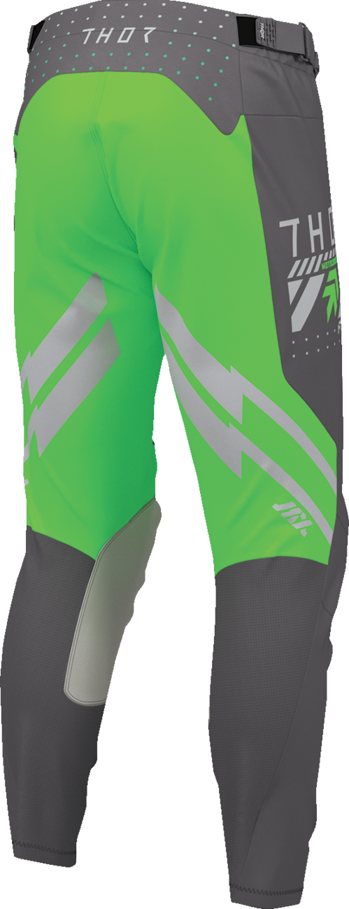 THOR Launchmode Futura motorcycle riding pants in charcoal and green showing durable fabric, ventilation panels, and secure fit.