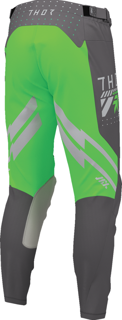 THOR Launchmode Futura motorcycle riding pants in charcoal and green showing durable fabric, ventilation panels, and secure fit.