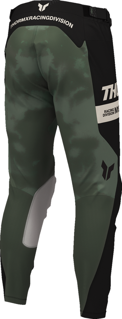 THOR Launchmode bleach pants in black and camo, US size 30, featuring distressed design and tactical style.