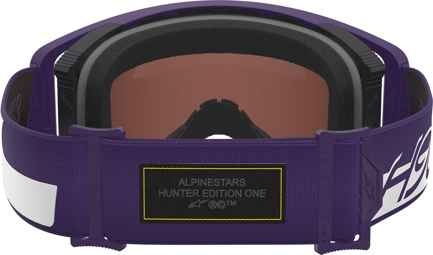 Alpinestars Supertech Goggle Hunta 96 XXV with purple and white frame and silver mirror lens for motocross riding.