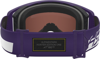 Alpinestars Supertech Goggle Hunta 96 XXV with purple and white frame and silver mirror lens for motocross riding.