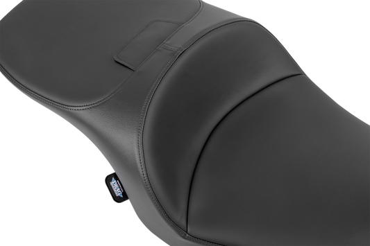 Drag Specialties forward position freedom seat for FLH/FLT motorcycles, vinyl and solar leather finish, designed for 2023-2025 models.
