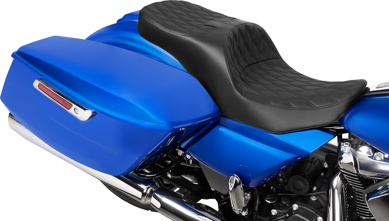 Black vinyl Drag Specialties forward position freedom seat with double diamond stitching for Harley FLH/FLT 2023-2025.