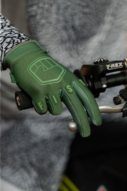 FIST HANDWEAR Strapped Earth Stocker Gloves in olive green, medium size, with strap design and reinforced palms.