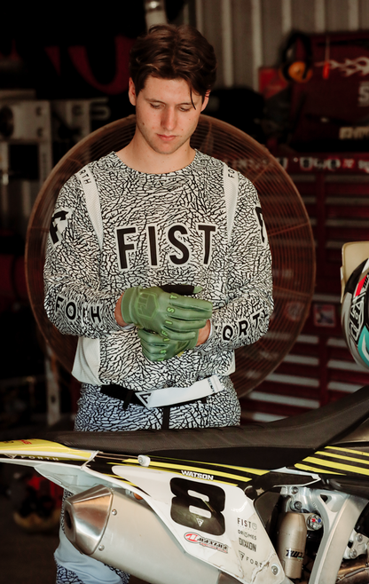 FIST HANDWEAR Strapped Earth Stocker gloves in olive green, medium size, with strap detail and reinforced palms.