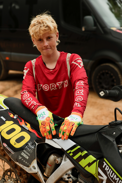 FIST Handwear Fruit Punch Gloves medium size with adjustable straps, designed for superior grip and comfort during workouts.