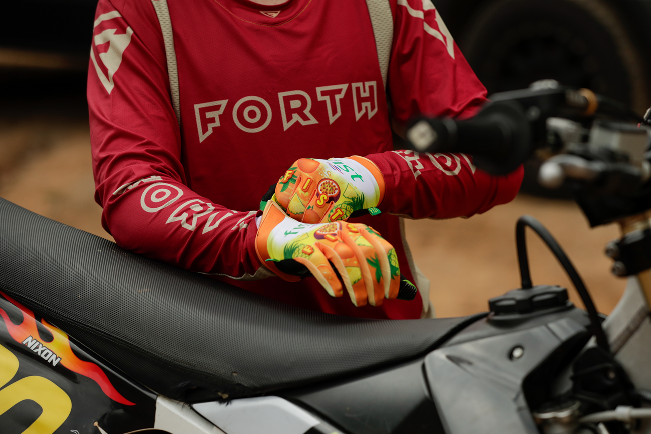 FIST Handwear Fruit Punch gloves in medium size with straps, designed for superior grip and comfort during workouts.