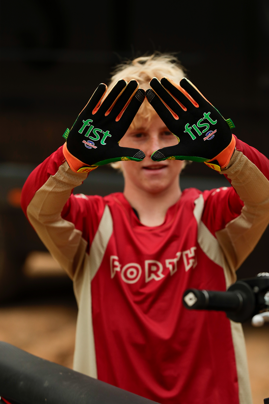 FIST Handwear Fruit Punch gloves in medium with straps, designed for superior grip and comfort, shown in the product image.