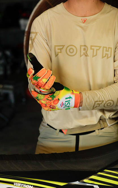 FIST Handwear Fruit Punch gloves in medium size with straps, designed for superior grip and comfort in workout or casual wear.