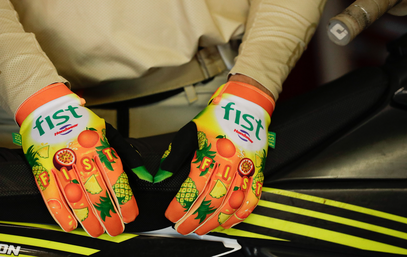 FIST Handwear Fruit Punch gloves in medium size with strapped design for superior grip and comfort, shown in the image.