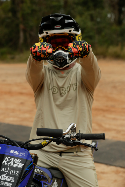 FIST Handwear R-Willy Red Label Mango Madness gloves in XS, featuring red straps and vibrant red color, designed for comfort and style